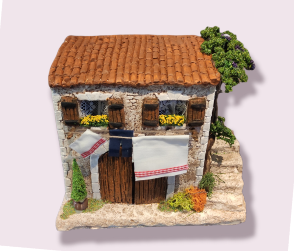 Maison avec étendage marron santons de Provence